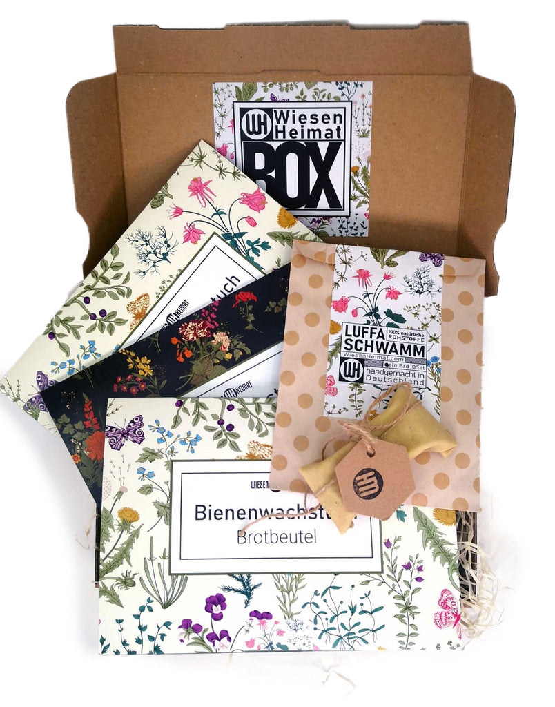 WiesenHeimat BOX EIne Geschenkbox mit Bienenwachtuch Produkten daraufsicht mit allen Produktenn